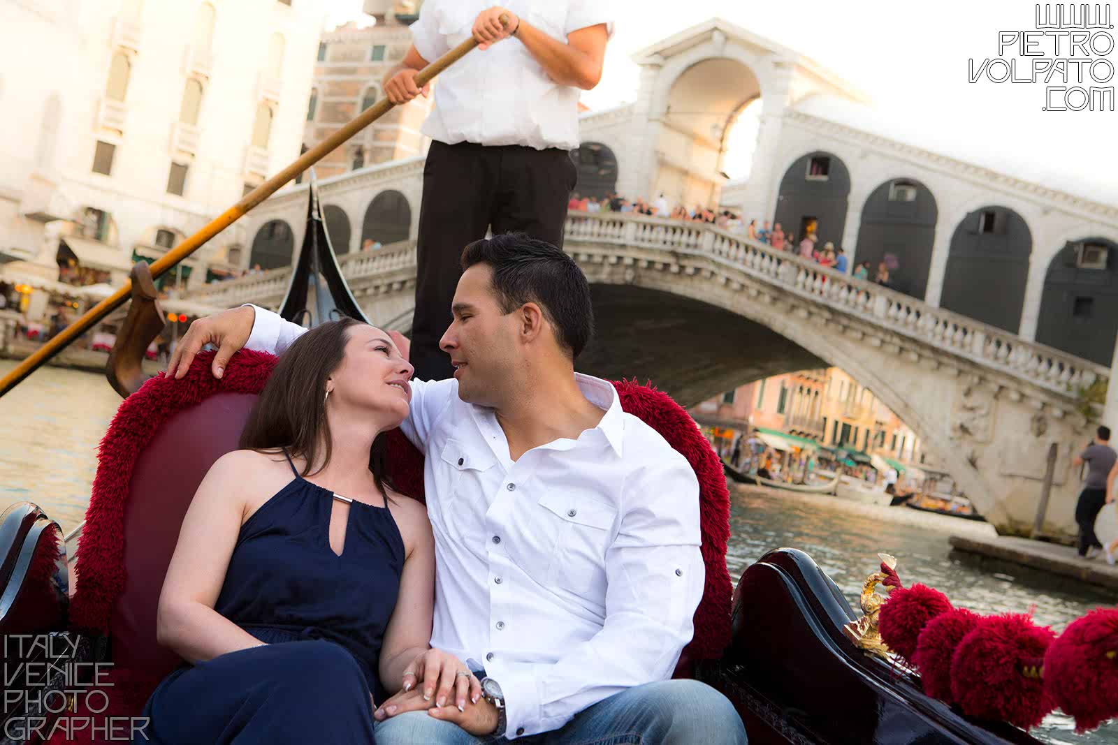 Photographer in Venice Italy for a vacation photo shoot during a walking tour and gondola ride - romantic and fun couple photo walk in Venice