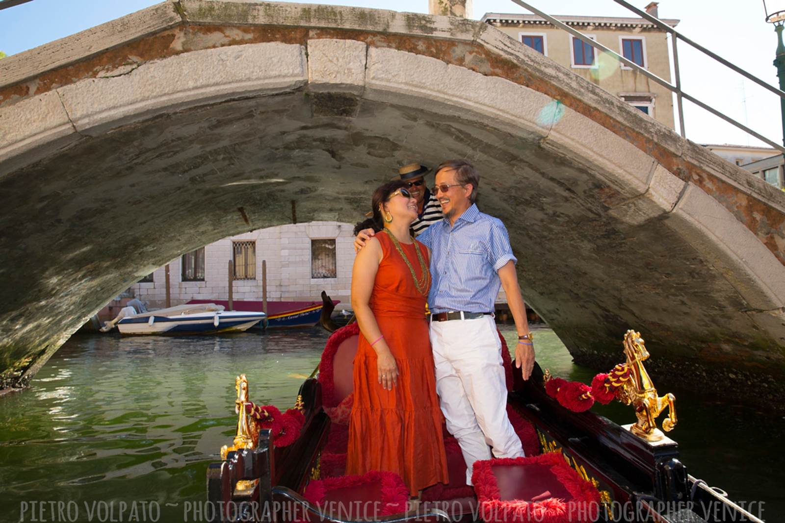 Photographer in Venice for romantic and fun photo shoot during a walking tour and gondola ride ~ Venice couple photo session